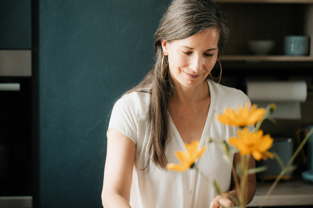 Photo of woman and flowers